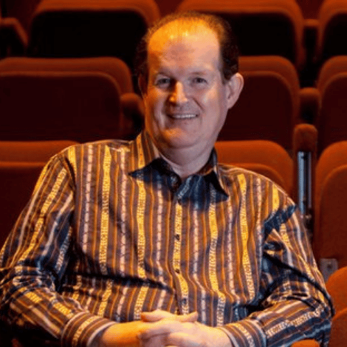 Broadcaster, Actor, Musician & After-Dinner Speaker Aonghus McAnally head shot front row speakers