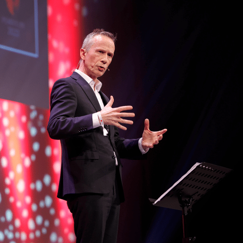 High Performance Speaker Gerry Duffy on stage at Pendulum Summit for Front Row Speakers