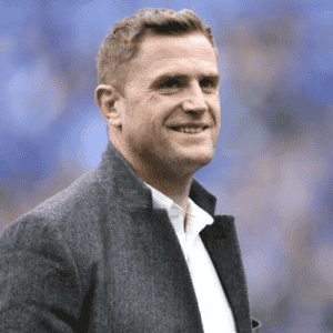 Former Rugby International Jamie Heaslip on the Rugby pitch smiling