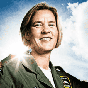 Former RAF Pilot, Entrepreneur, and Expert on Human Behaviour Mandy Hickson headshot in her pilot uniform