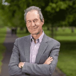 Doctor and Best-Selling Author Dr Harry Barry headshot of him standing in front of greenery for Front Row Speakers