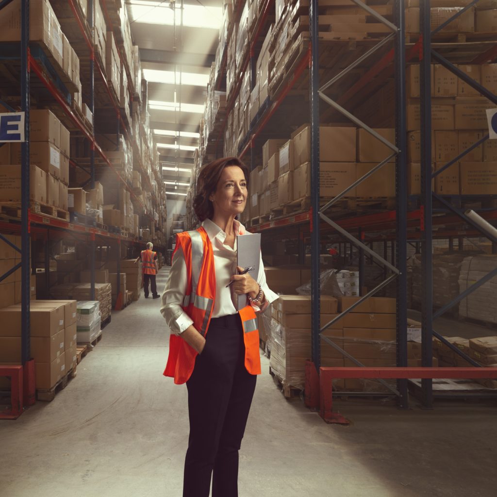 Former Managing Director of JJ O’Toole Ltd & Leadership Speaker Vicki O'Toole standing in a warehouse
